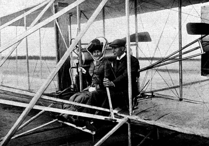 Illustration:
Wilbur Wright macht eine Fahrt mit Frau Hart O’Berg