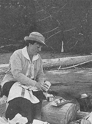 A woman outdoors in scouting
attire