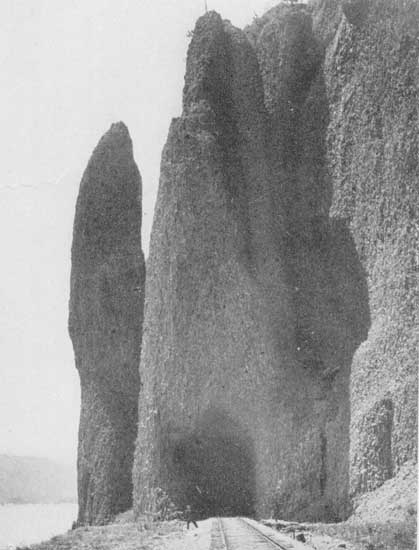 Along the Columbia—"Grotesque rocks rise sheer from the
river's edge"

