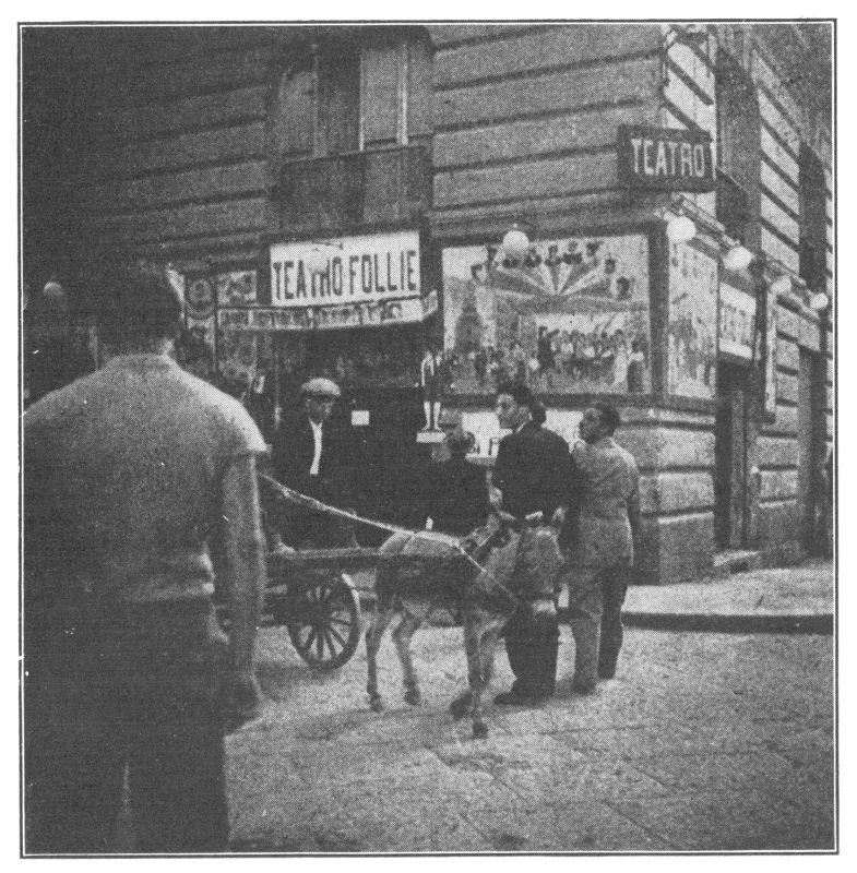 IN FRONT OF THE MARIONETTE THEATRES