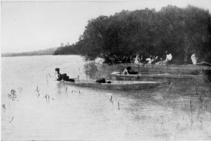 CANOE VOYAGING ON THE AMAZON: A NOONDAY REST.

To face p. 96.