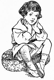 Boy sitting on cushion