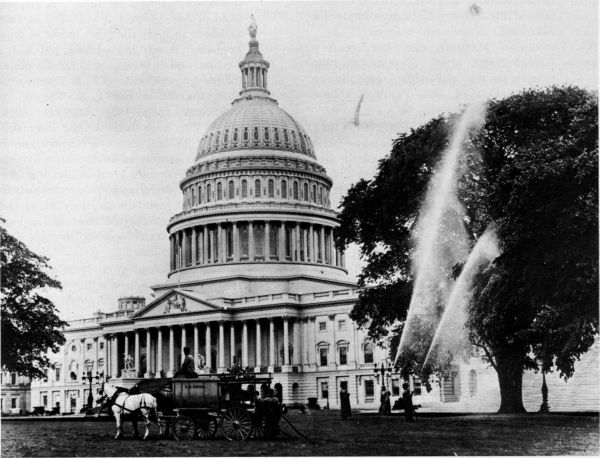 Figure 31.--Fitzhenry-Guptill power sprayer (1908), seen here spraying for elm leaf beetles on the grounds of the U.S. Capitol,
May 1911. (Catalog No. 366.)