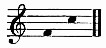 here the author
expresses a range from the F above middle-C (or F4) to the C above
middle-C (C5) by inserting a staff