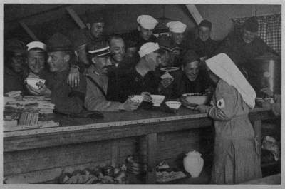 SUPPER HOUR AT BORDEAUX
No matter what hour; always the gobs and buddies—other armies as well as our own—ready
with 100 per cent appetites