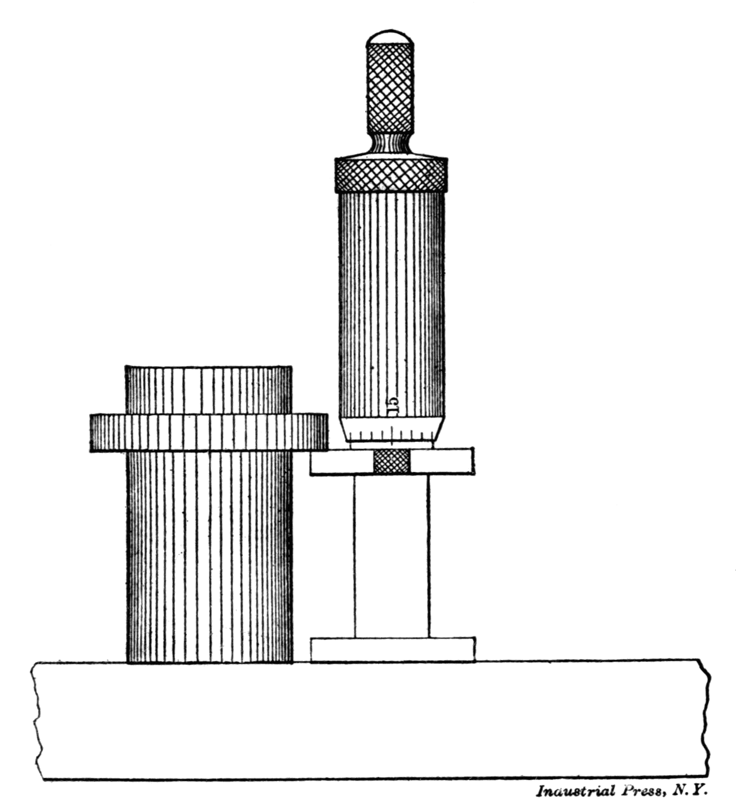 Fig. 20. Micrometer in Fig. 19 used as Height Gage