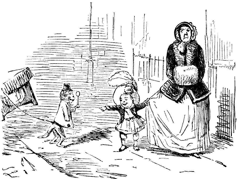 Child pointing to a monkey.