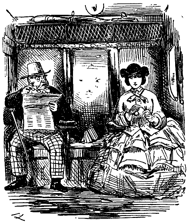 Man and woman in railway carriage.