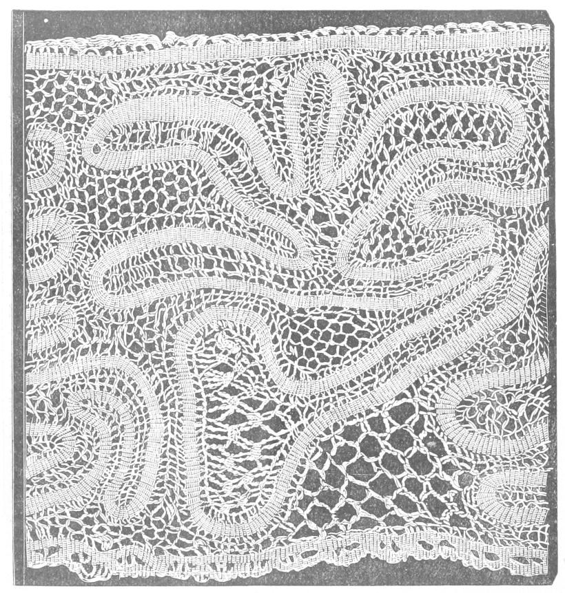 Lace with sinuous worked band