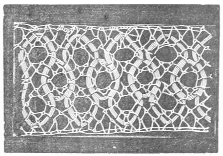 Lace with peanut shaped motifs