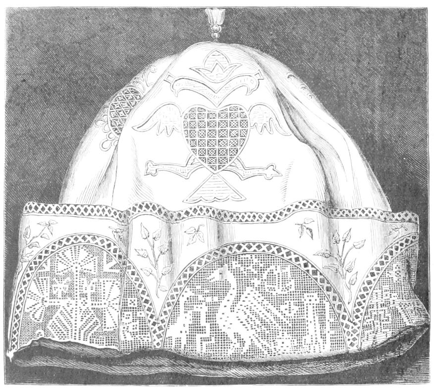 Domed cloth hat with lace panels