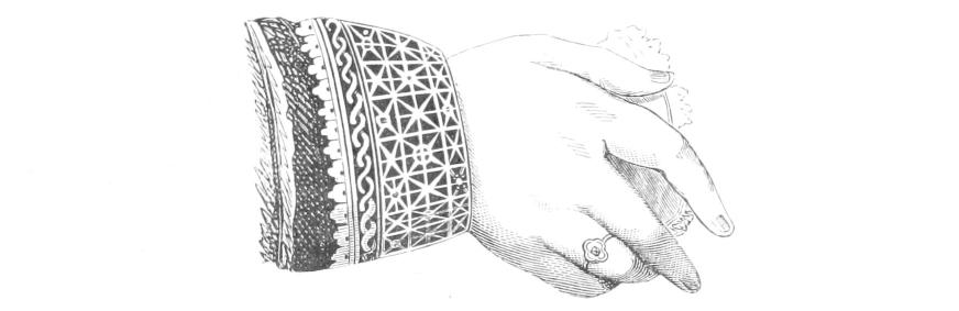 Detail of lace cuff and hand