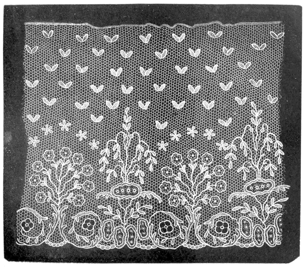 Lace with flowering plants and small
    butterflies