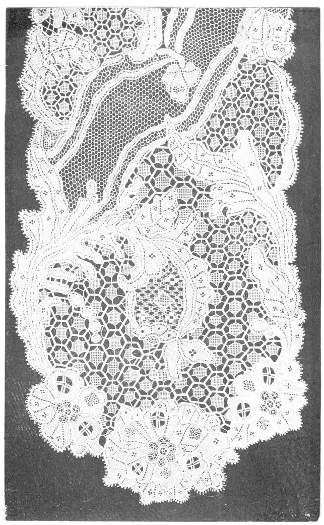Lace with areas of honeycomb pattern