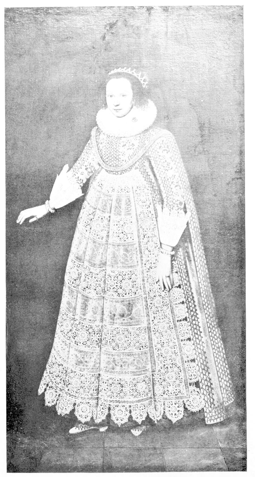 Young woman wearing full length lace
    dress.